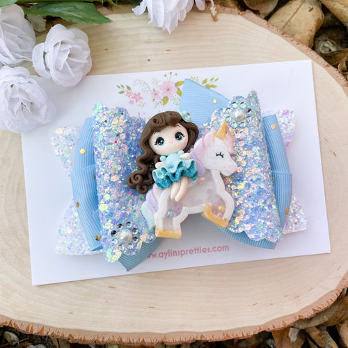 Blue Girl on Unicorn Ribbon Bow